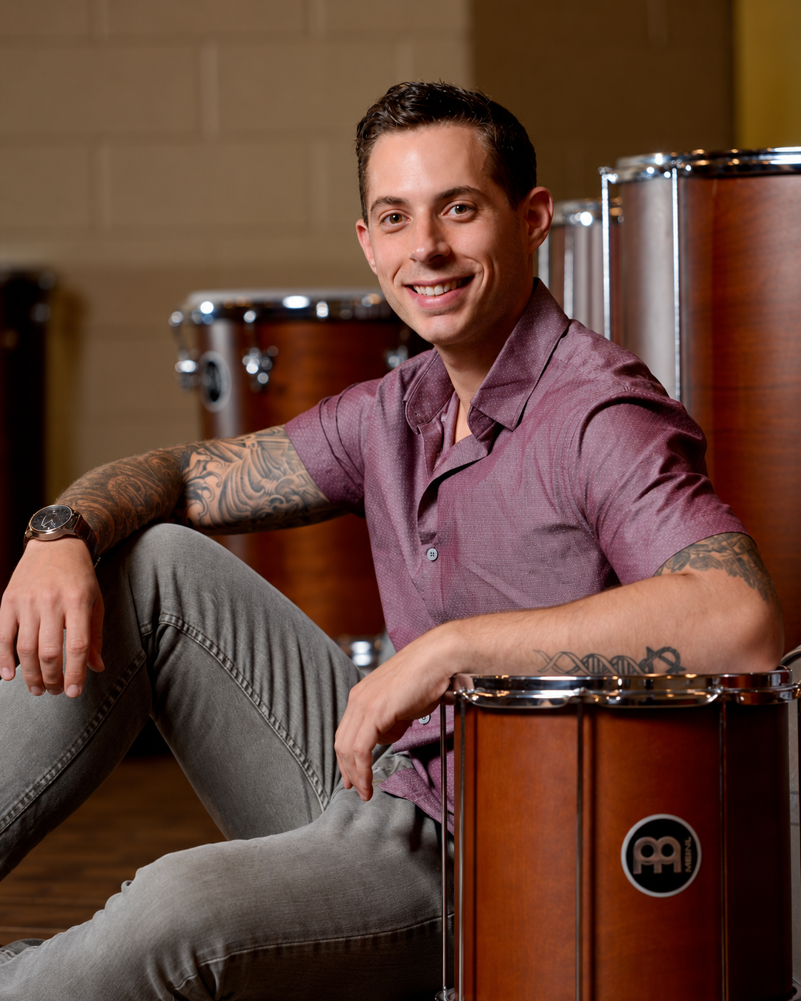 A.J. Merlino photographed with percussion instruments for the Reading Eagle Portrait of the Artist series